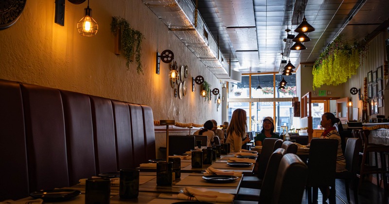 Party diner table, booth, street view window behind