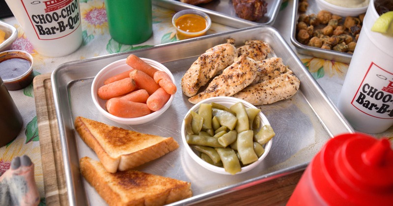 Grilled chicken Plate with toast, carrots and broad green beans