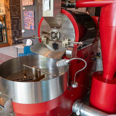 Red commercial coffee roaster.