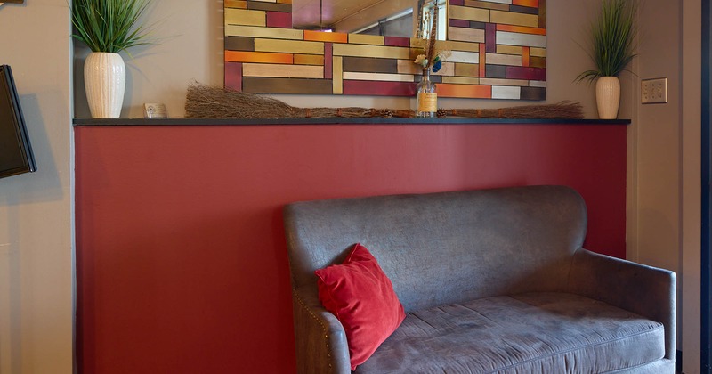 Interior, seating place couch by decorated wall