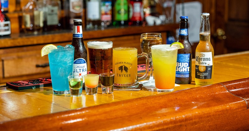 Assorted drinks served on bar counter