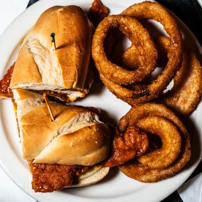 Hot Cheesy Stripper with onion rings.