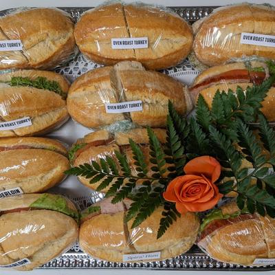 Wrapped baguette sandwiches.