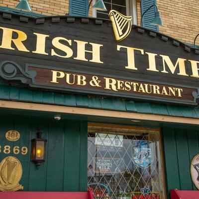 Exterior Iris Times Pub and Restaurant sign and entrance