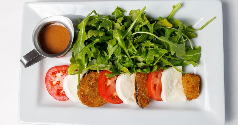 Eggplant caprese with arugula