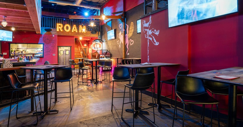 Interior, seating area, tables with bar stools