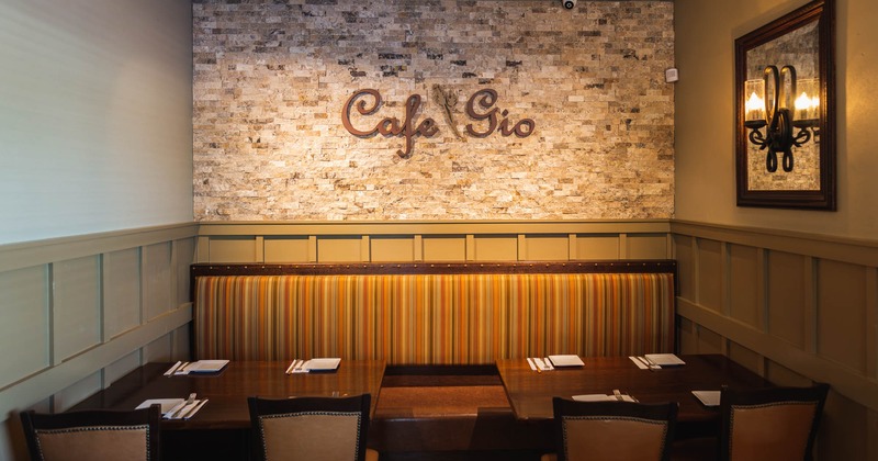 Interior, dining area, restaurant logo on the wall