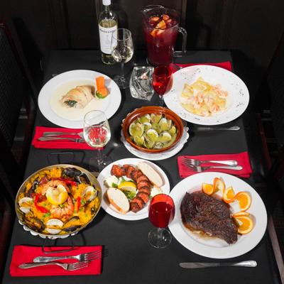 Assorted food and drinks on the table.