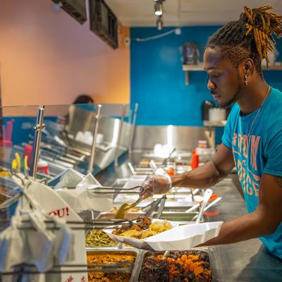 A person preparing a meal.