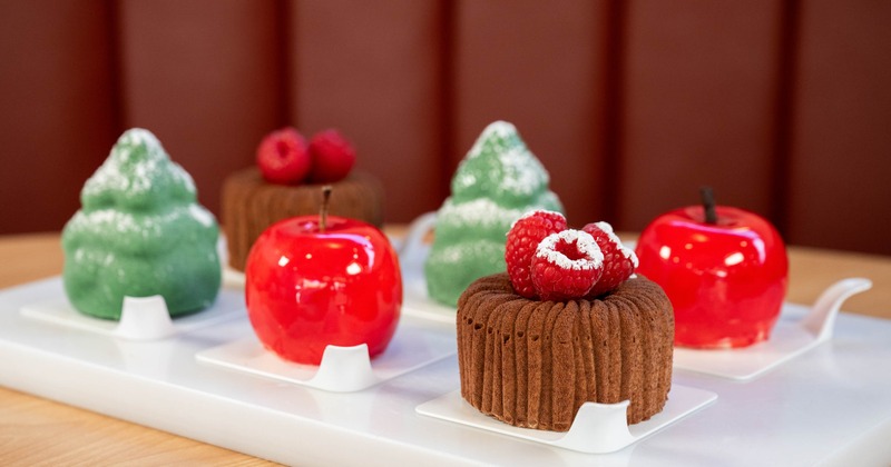 Chocolate cakes and candy shaped like apples and trees