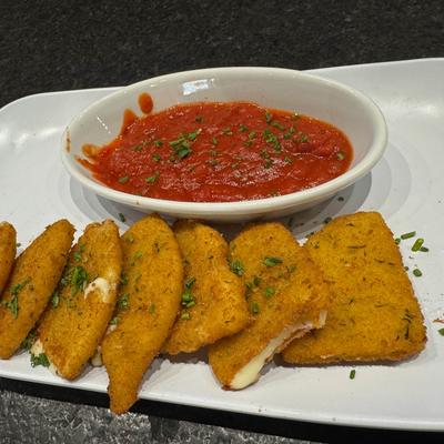 Mozzarella sticks with marinara sauce.