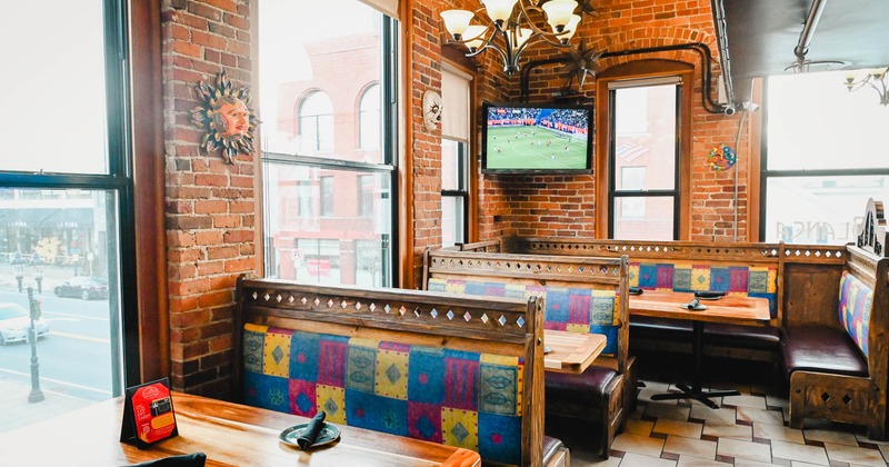 Interior, seating area, TV screen on the wall