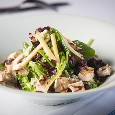 Chopped Chicken Salad with greens, apples, cranberries, and blue cheese.