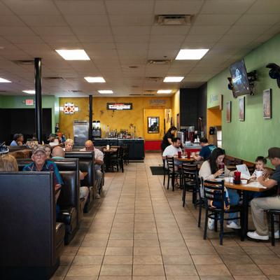 Lots of guests dining.