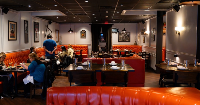 Interior, dining area, guests enjoying their food and drinks