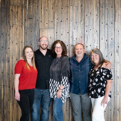 People posing for a photo.