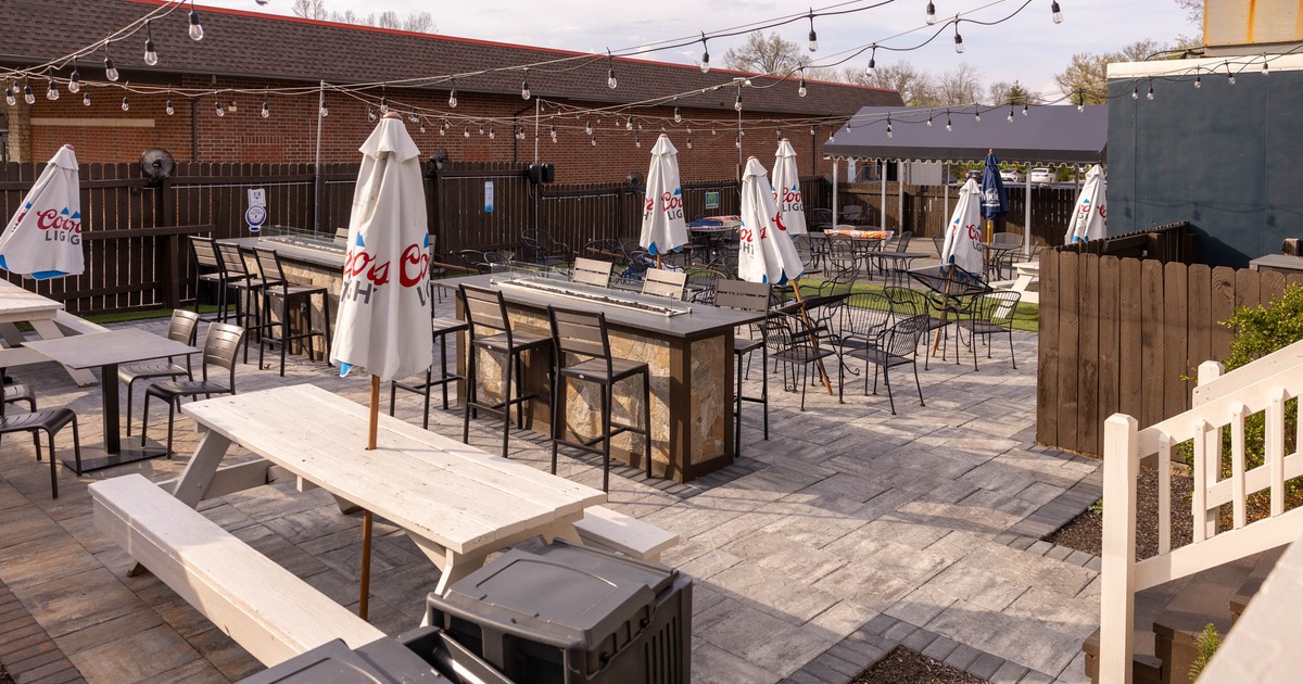 Outdoor, seating area with tables and chairs
