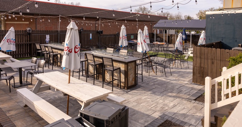 Outdoor, seating area with tables and chairs