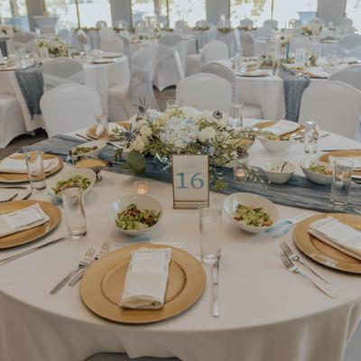 Wedding & event table setting, chargers, table numbers, event food.