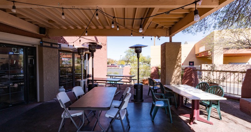 Exterior, patio with tables and chairs