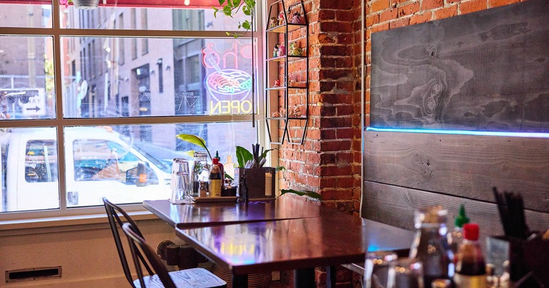 Interior, tables and chairs ready for guests