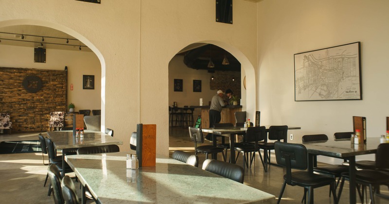 Interior, seating area with tables an chairs
