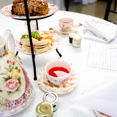 Tea and biscuits, served on a table.