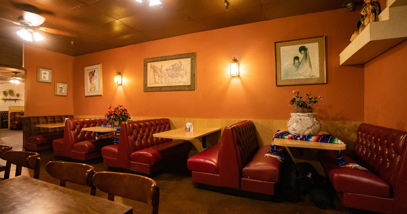 Interior, tables and leather double booth seating