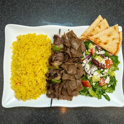 Greek Combo with Beef kabob, rice, salad, and pita.