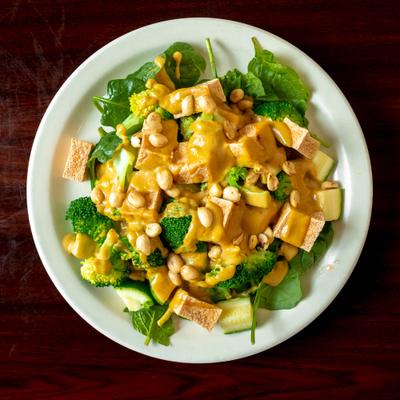 Steamed broccoli and zucchini, with fresh spinach, Thai peanut sauce and ground peanuts.