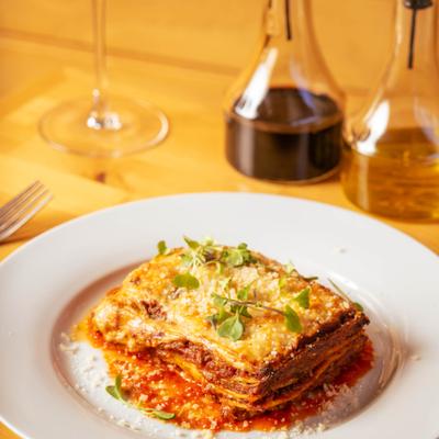 Lasagna Bolognese with tomato sauce and herbs.