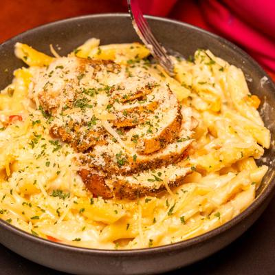 Bowl of Chicken Alfredo pasta.