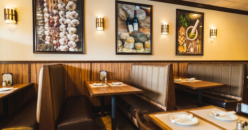 Interior, dining booths with set tables