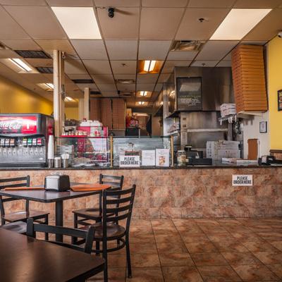 Restaurant's interior with bar counter.