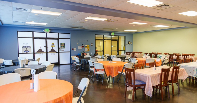 Interior, tables and chairs with near entrance