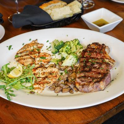 Grilled chicken breast and steak.