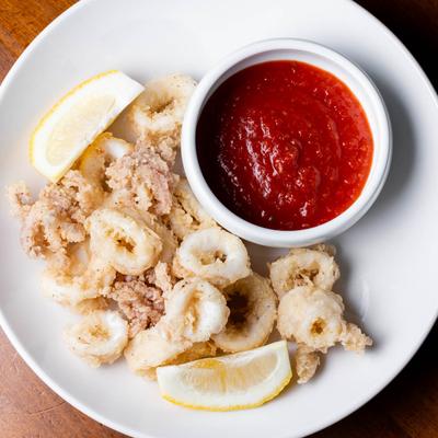 Fried calamari, with marinara sauce.