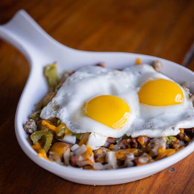 Fries eggs and mixed vegetables