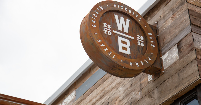 Exterior, bar sign on wall