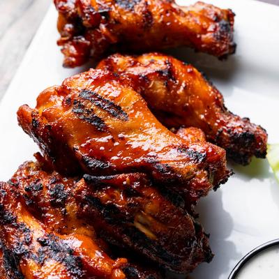 Grilled and glazed wings, close up.