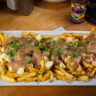 Served poutine fries.