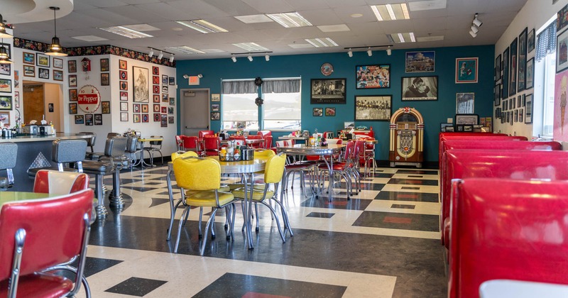 Dining area, tables and seats, wall decorations