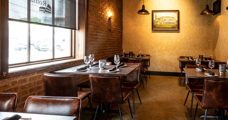 Interior, dining space with set tables