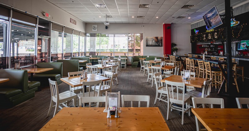 Interior, booth seating, dining tables and the bar