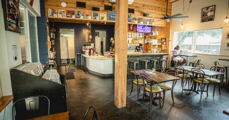 Interior, seating area with a bar in the back
