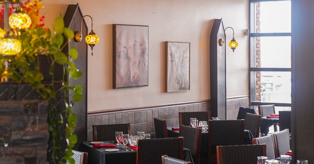 Interior, tables and chairs ready for guests