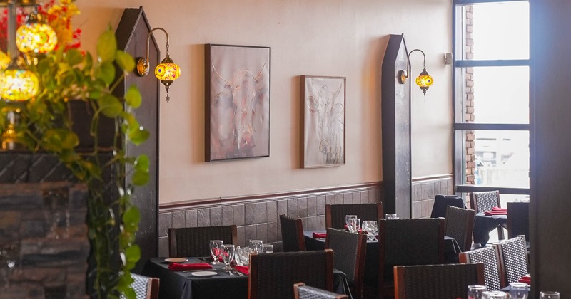 Interior, tables and chairs ready for guests