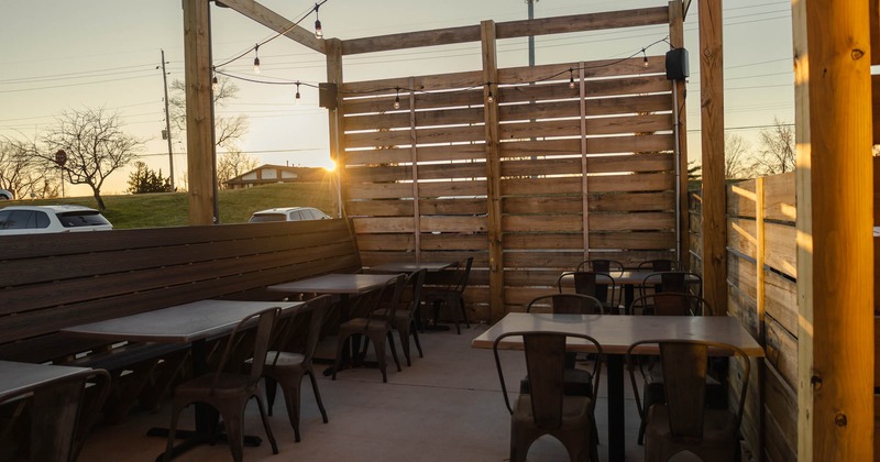 Exterior, patio, tables and benches, sunset