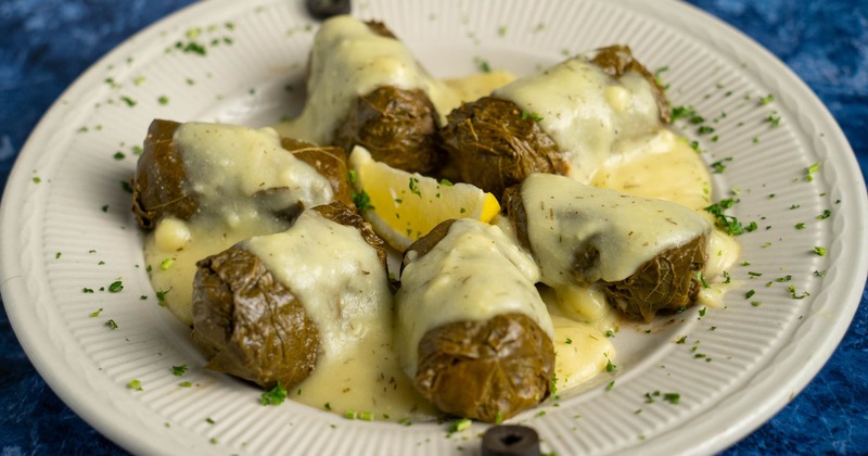 Stuffed vine leaves with creamy sauce