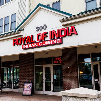 Royal of India restaurant storefront with signage and glass doors.